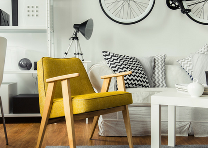 Yellow Chair in Apartment yellow chair in black and white apartment