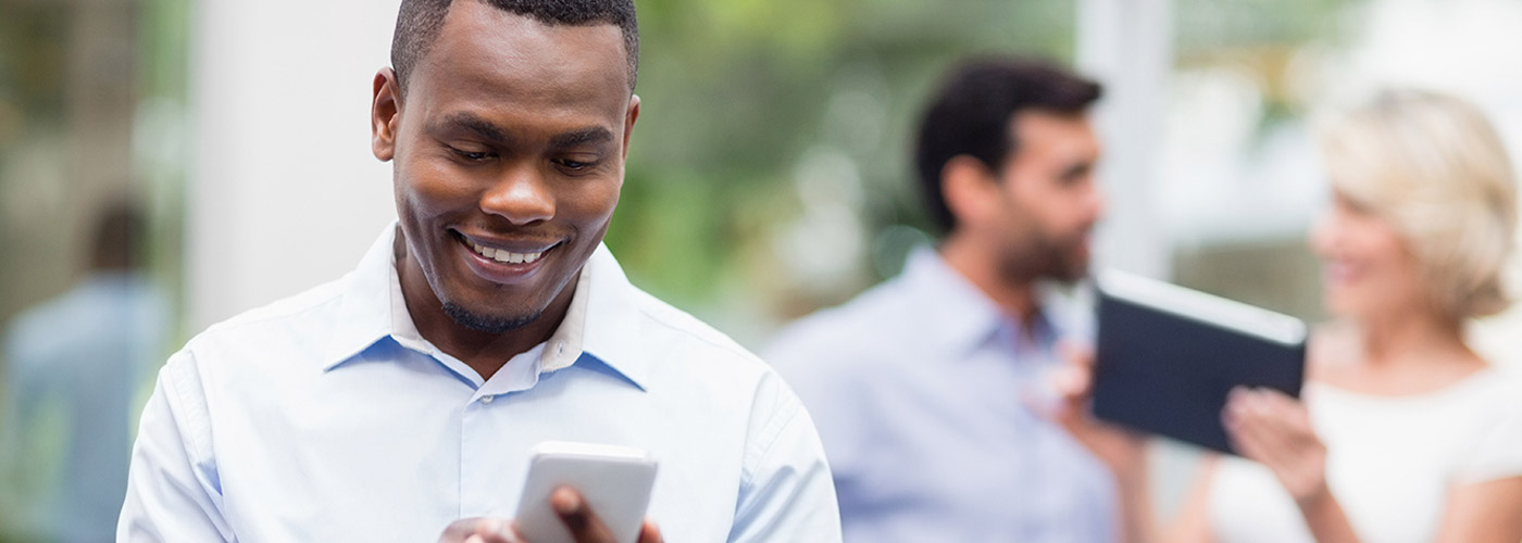 Business Concierge Man on phone outside getting support